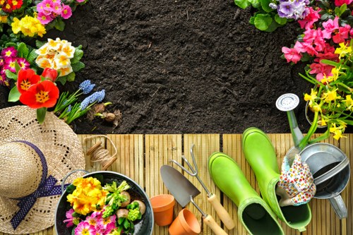 Gardener mowing a lawn following best practices